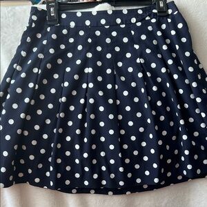 I crew Navy and white Polka Dot Skirt. Size 4 length 18”